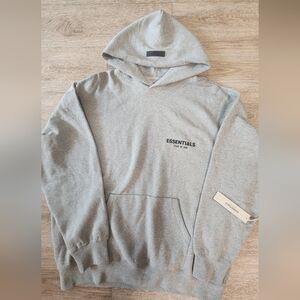 BRAND NEW ORIGINAL ESSENTIAL FEAR OF GOD HOODIE ( DARK OAT MEAL)  SIZE LARGE